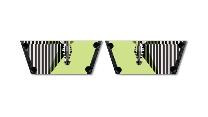Zebra Pop snap-on shoe strap set close-up on cork wedge - graphic zebra face with radiating black and white stripes on lime green by Soule