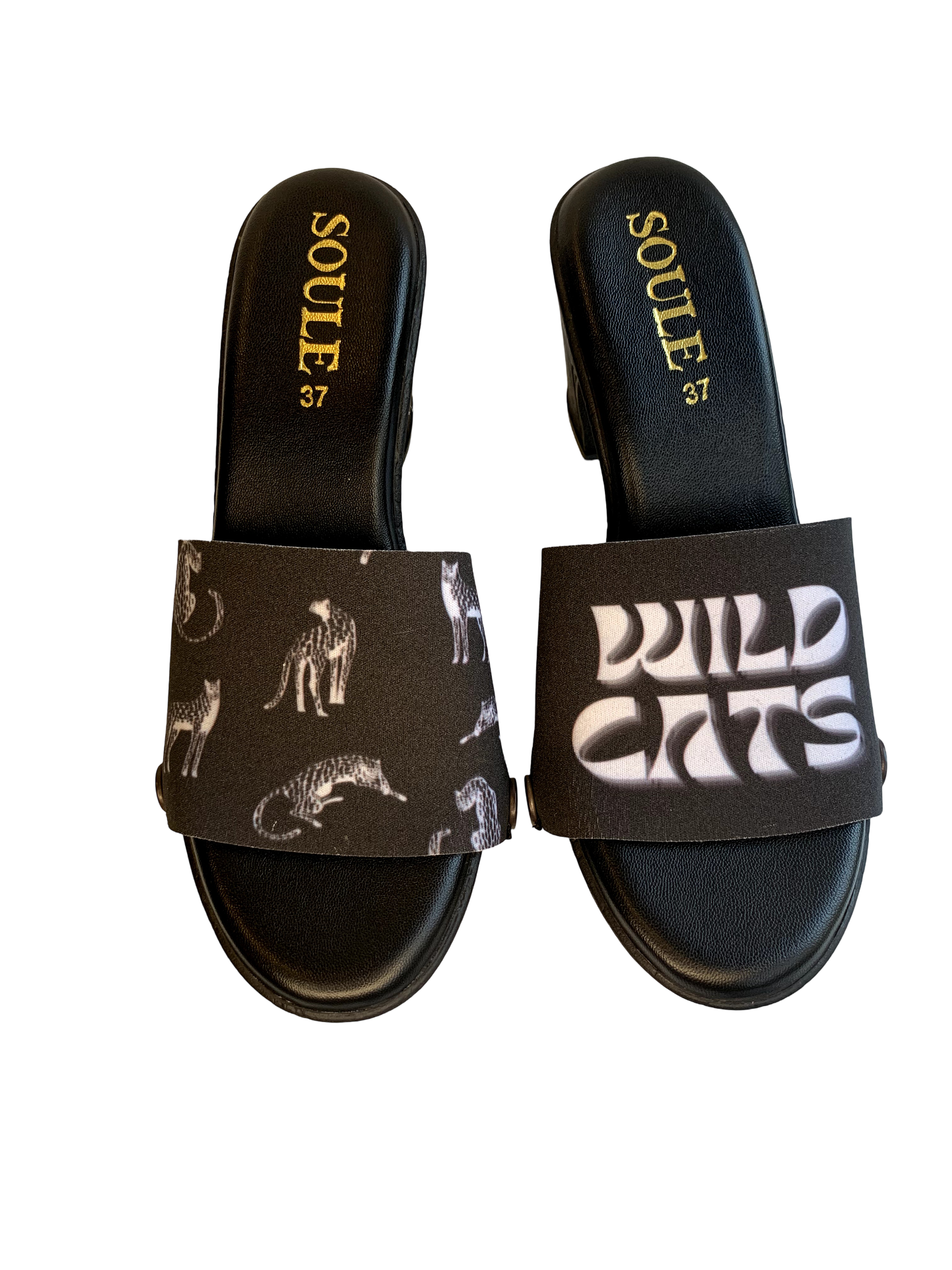 Cheetah Noir snap-on shoe strap set close-up on black Heels - dense and editorial white cheetah print on jet black by Soule