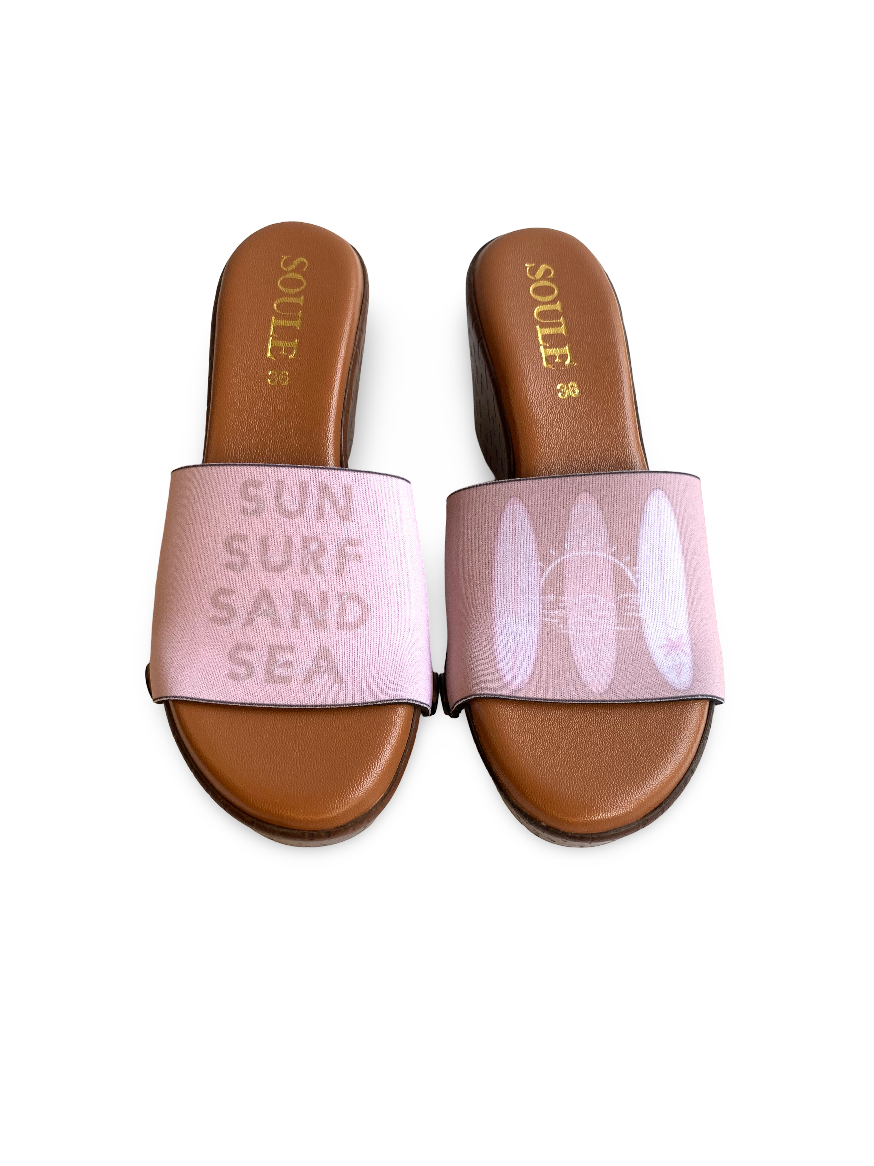  Close-up of Sand Surf & Sea interchangeable strap on brown wedge sole by Soule Footwear on white background