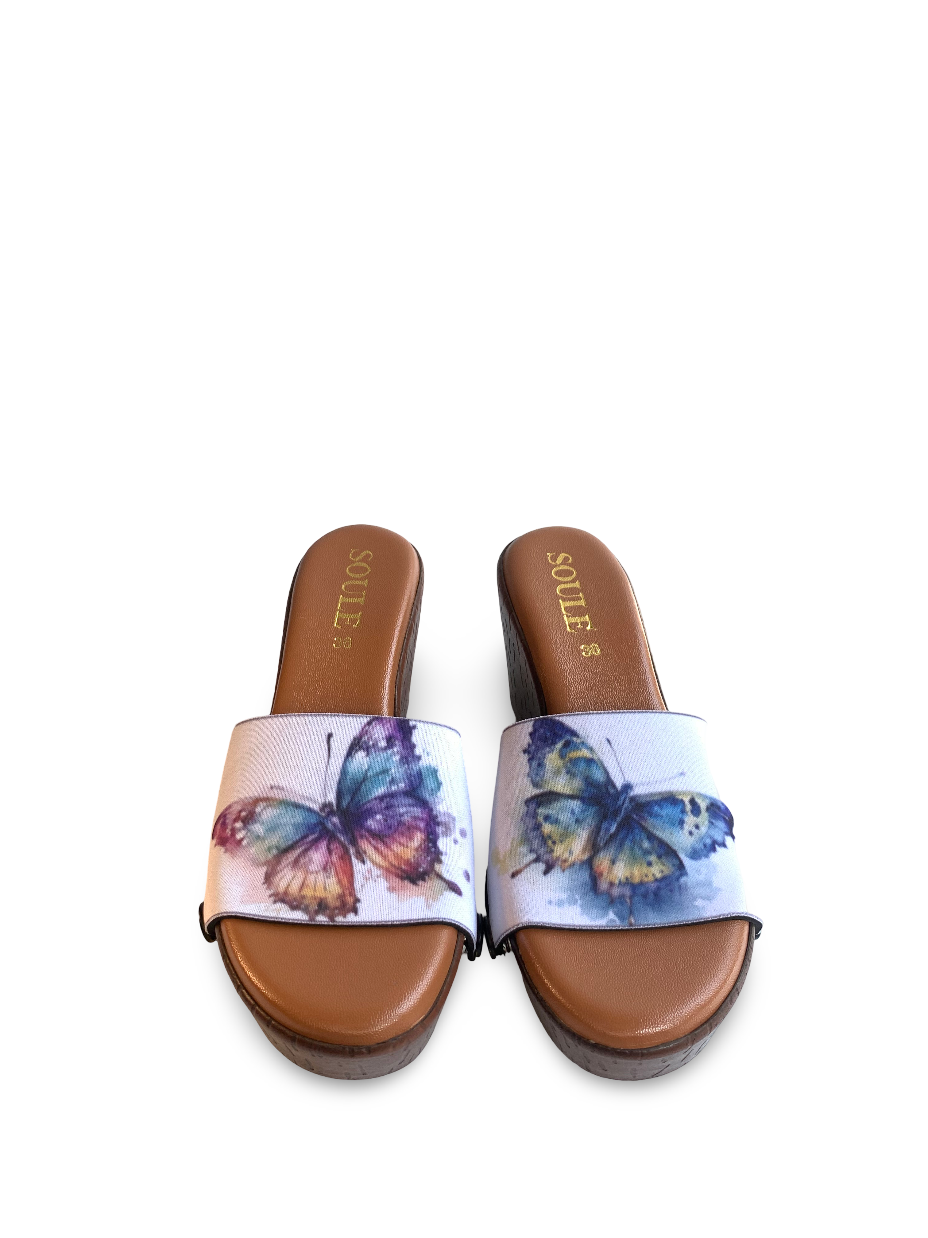 Watercolour Wings snap-on shoe strap set close-up on cork wedge - rainbow watercolour butterfly and teal orange butterfly on white by Soule