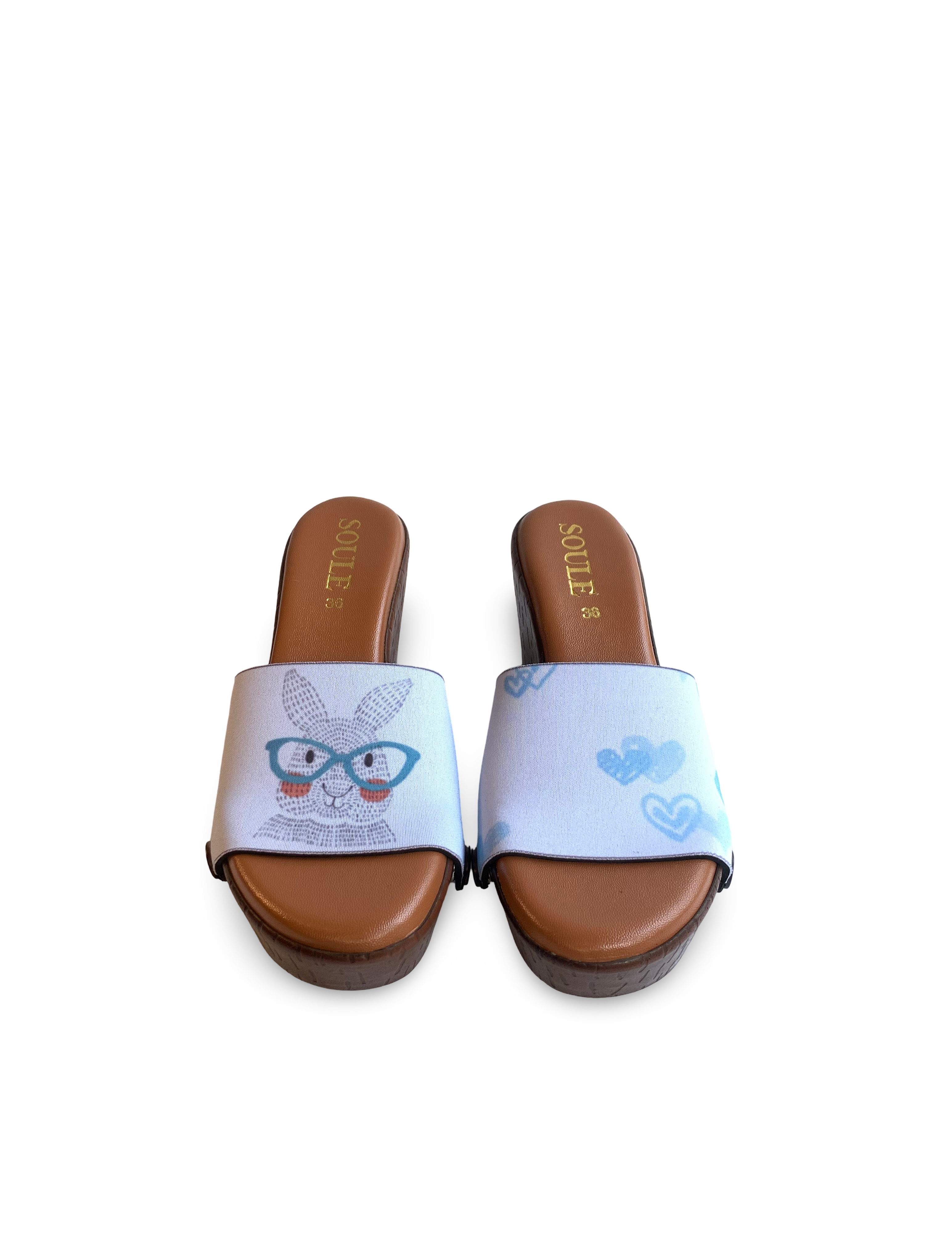 Bunny Hearts snap-on shoe strap set close-up on cork wedge - zentangle bunny in teal glasses and watercolour blue hearts on soft ice blue by Soule