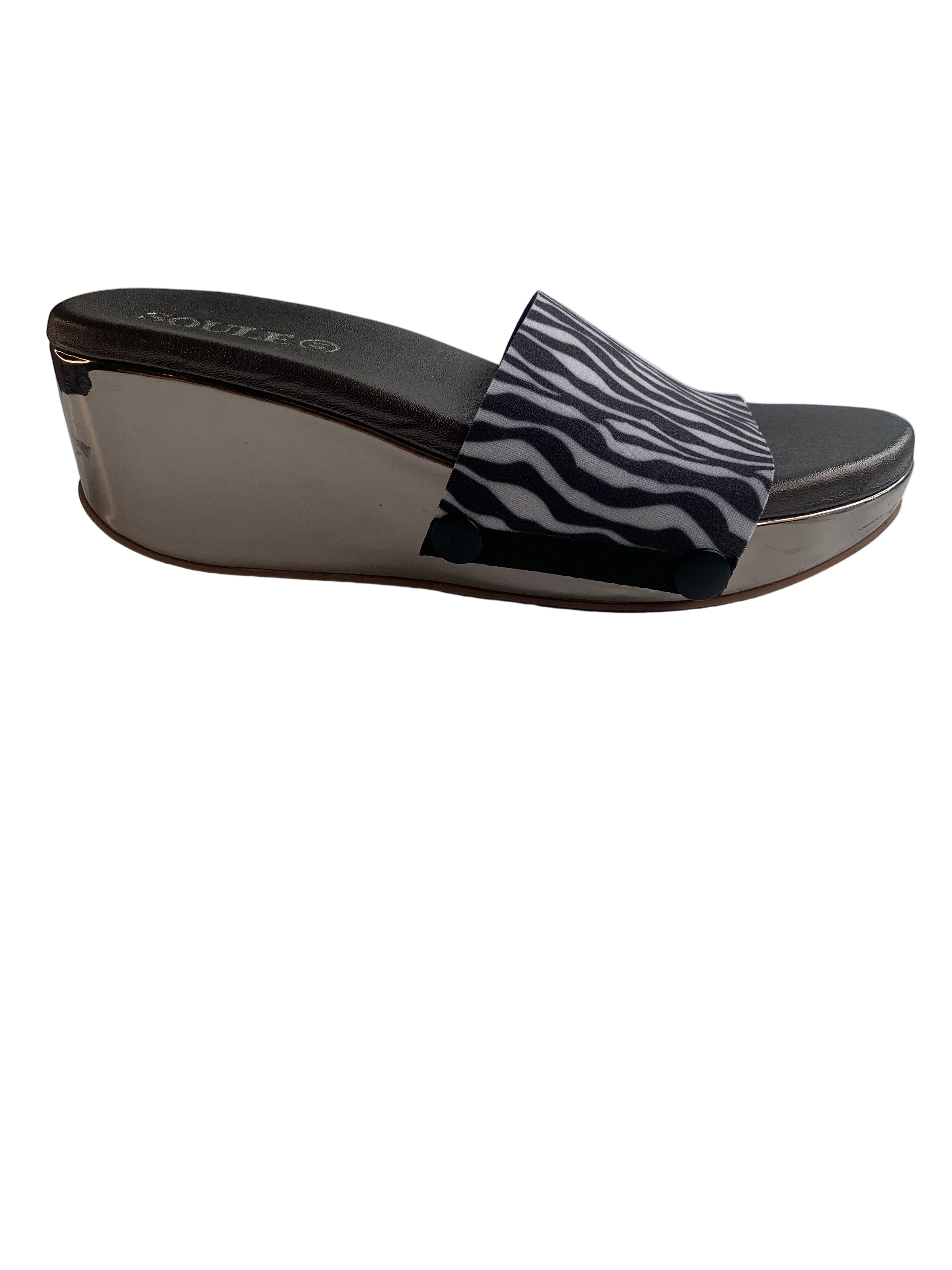 Close-up of Zebra Elegance black and white zebra print interchangeable strap on gun metal wedge sole by Soule Footwear 