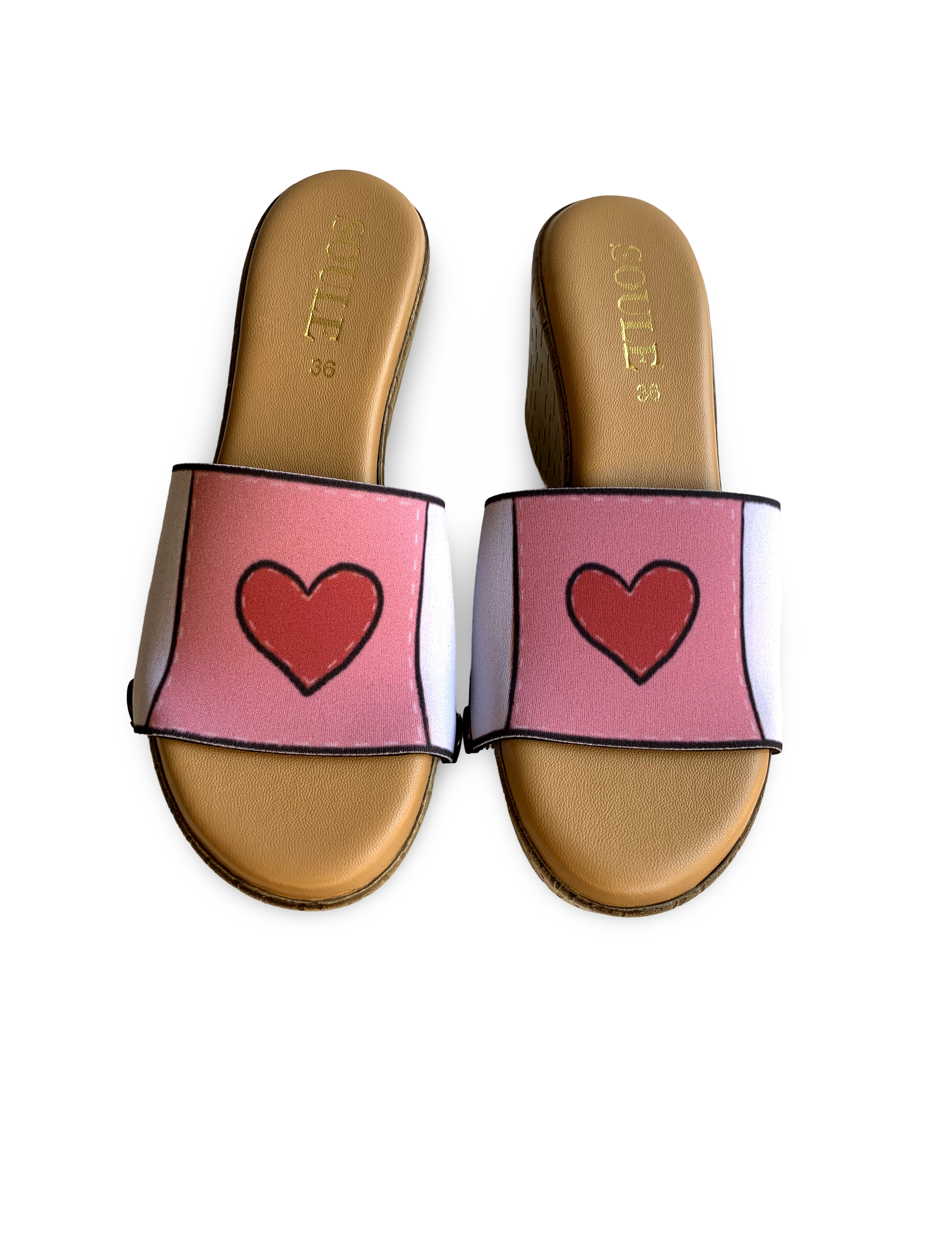Heartbeat snap-on shoe strap close-up on cork wedge - white with coral panel and bold red heart by Soule