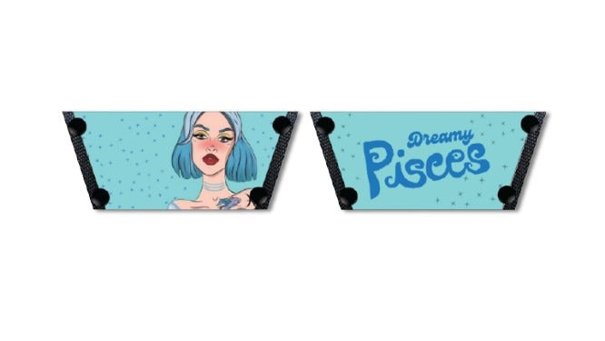 An interchangeable shoe strap featuring a celestial blue background with sparkling stars and an illustration of a woman with closed eyes and a ethereal aura. Text on the strap reads 'Dreamy Pisces'by soule footwear